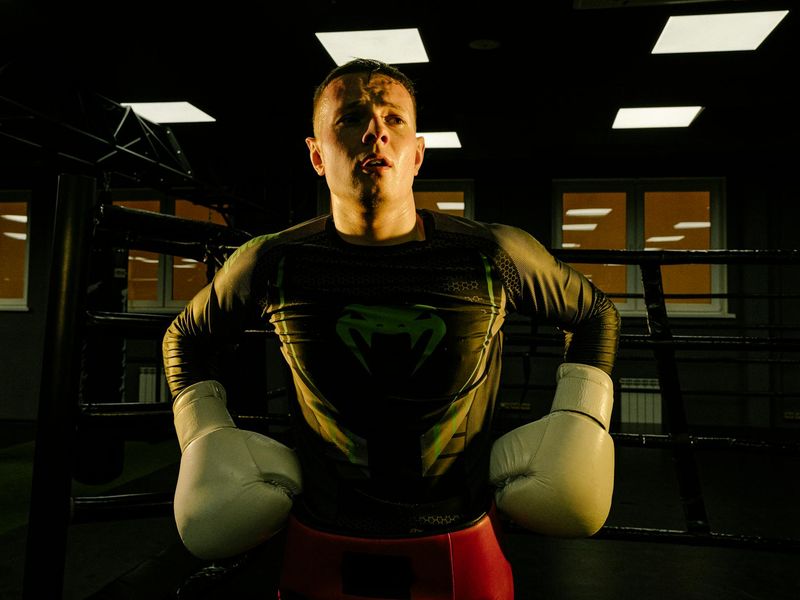 Close-up of a person's focused expression during exercise.